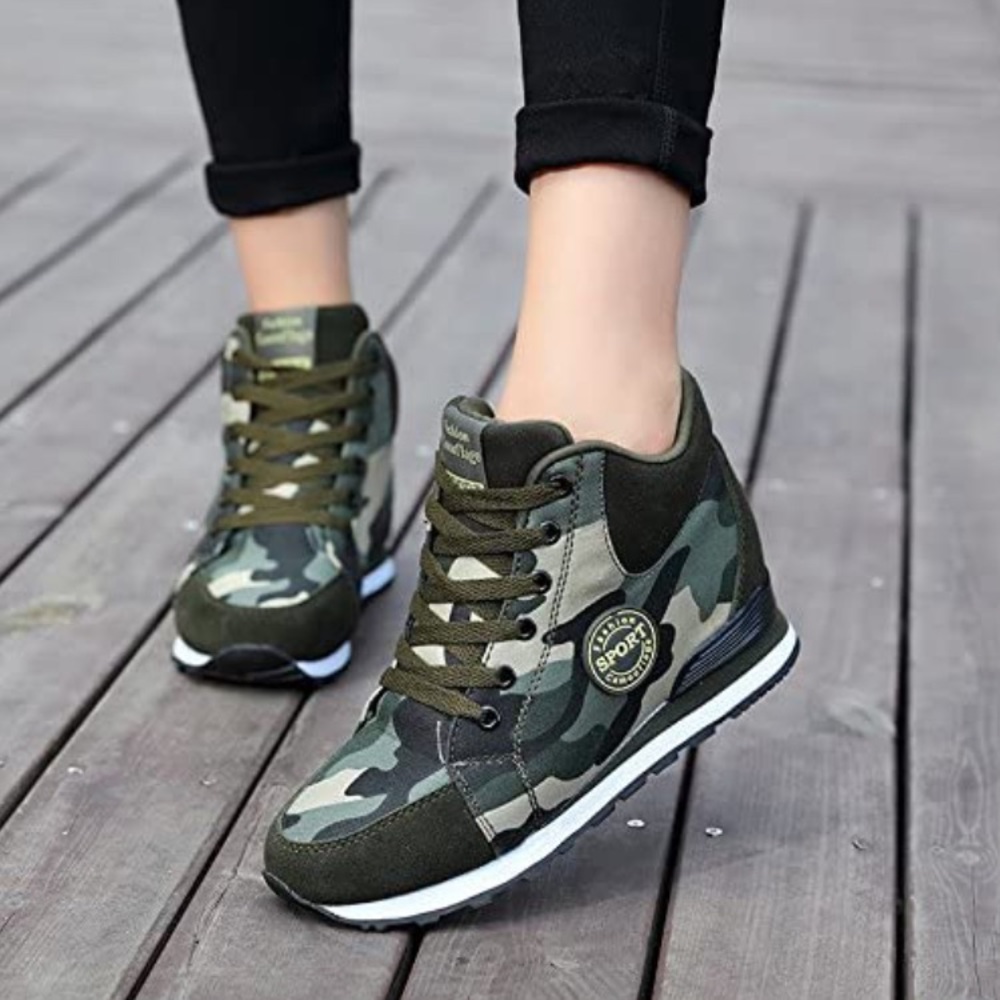 Woman’s camouflage size 9 heeled sneaker